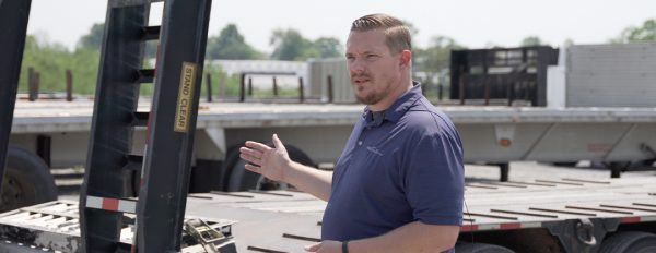 Hauling Equipment on Step Decks and Flatbeds.